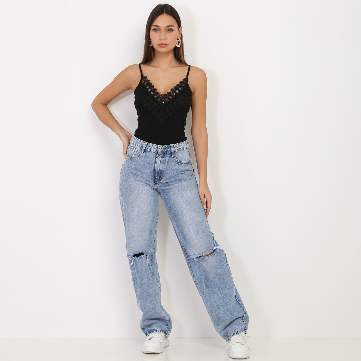 Jeans déchiré au genoux sale